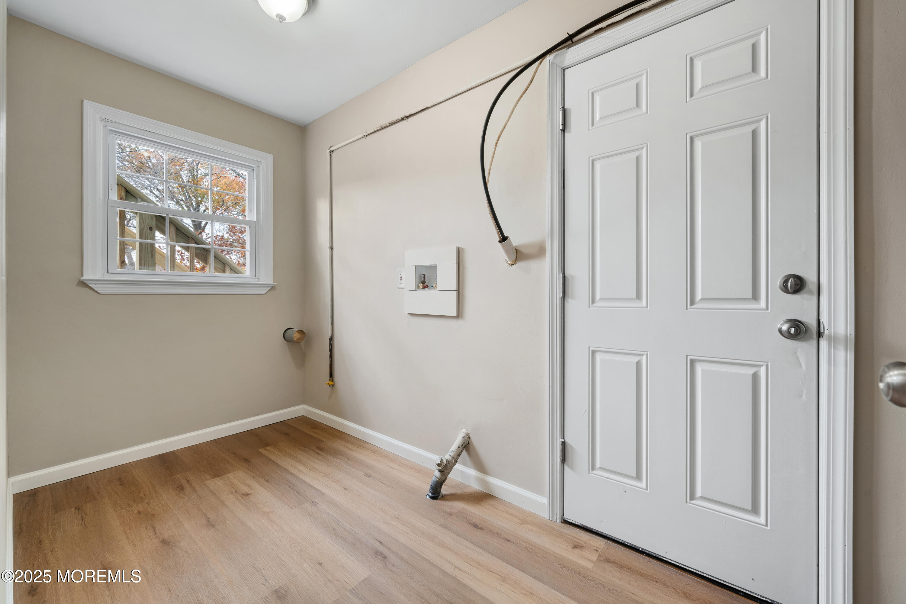 137 Red Bank Avenue Bayville, NJ 08721 - Photo 22 of 24 a view of an entryway with wooden floor