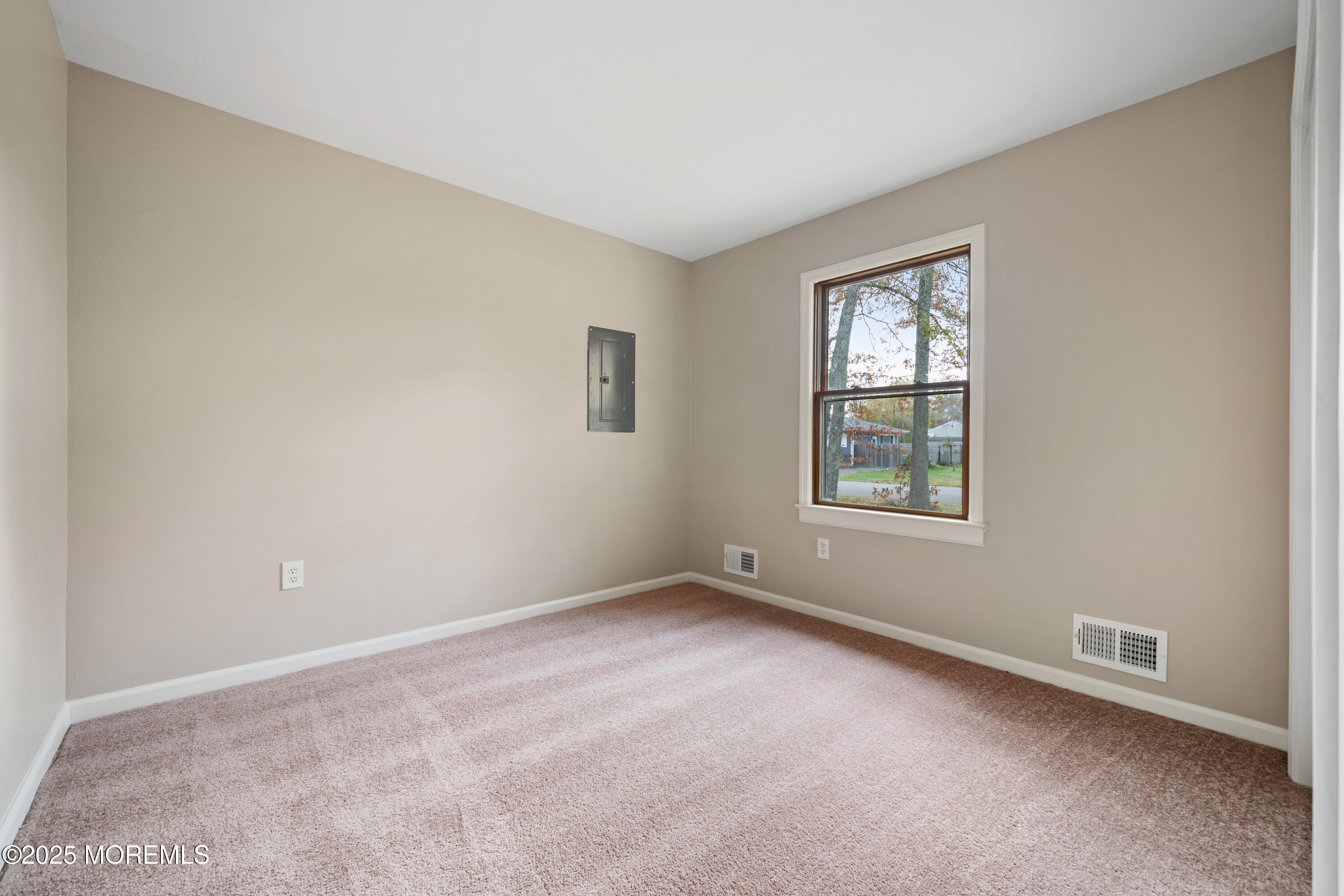 137 Red Bank Avenue Bayville, NJ 08721 - Photo 23 of 24 an empty room with windows