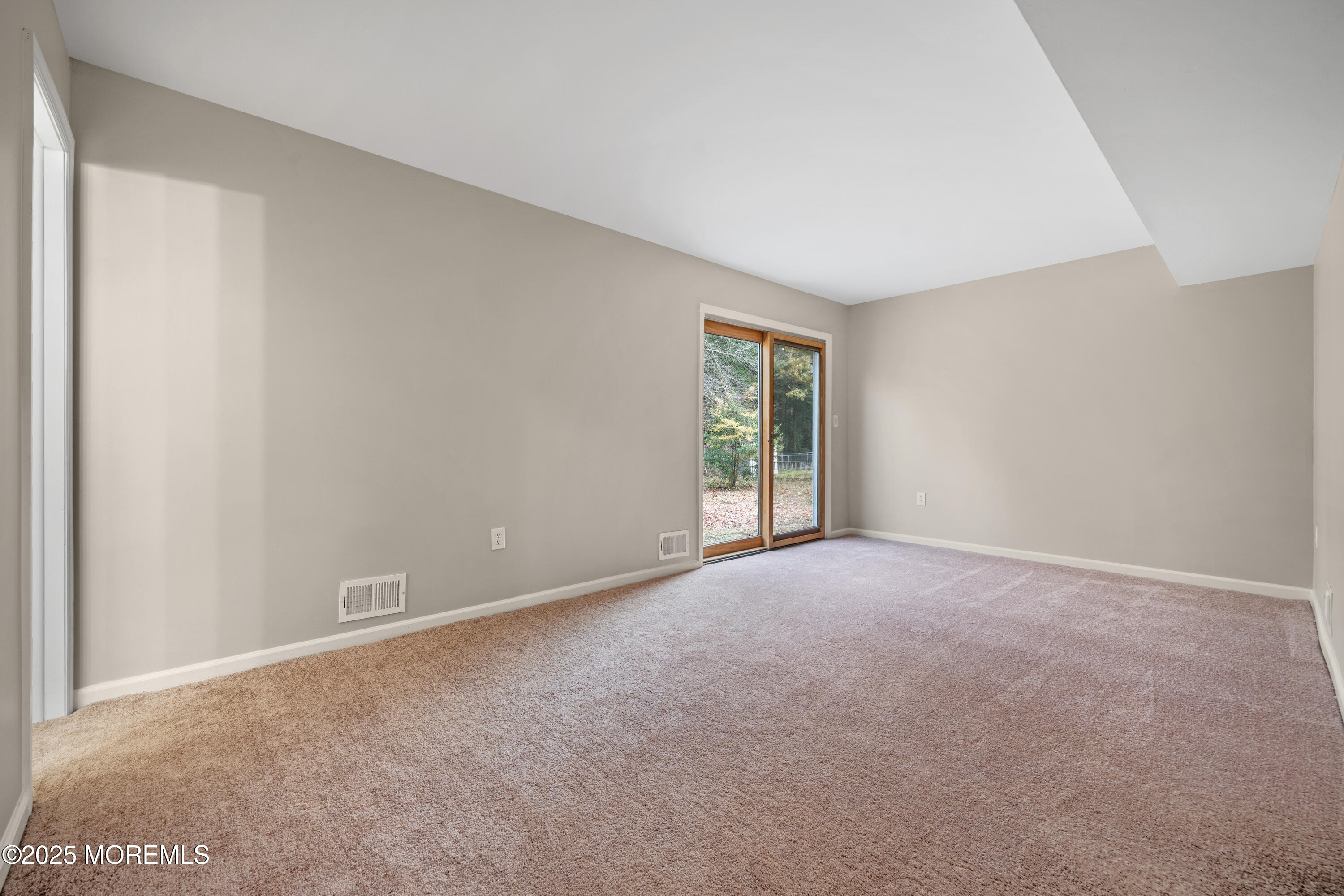 137 Red Bank Avenue Bayville, NJ 08721 - Photo 5 of 24 a view of an empty room with a window