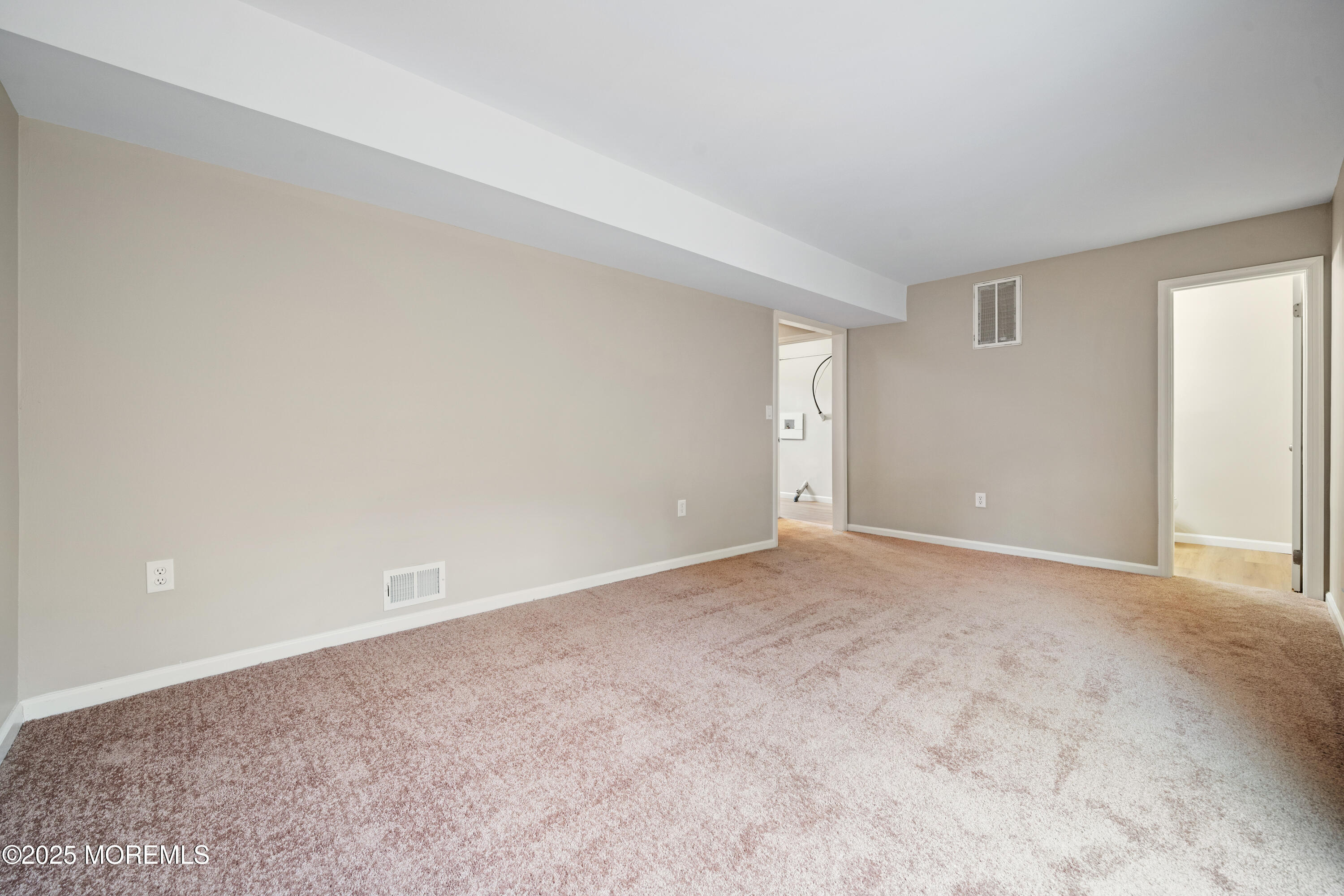 137 Red Bank Avenue Bayville, NJ 08721 - Photo 6 of 24 a view of an empty room and closet area