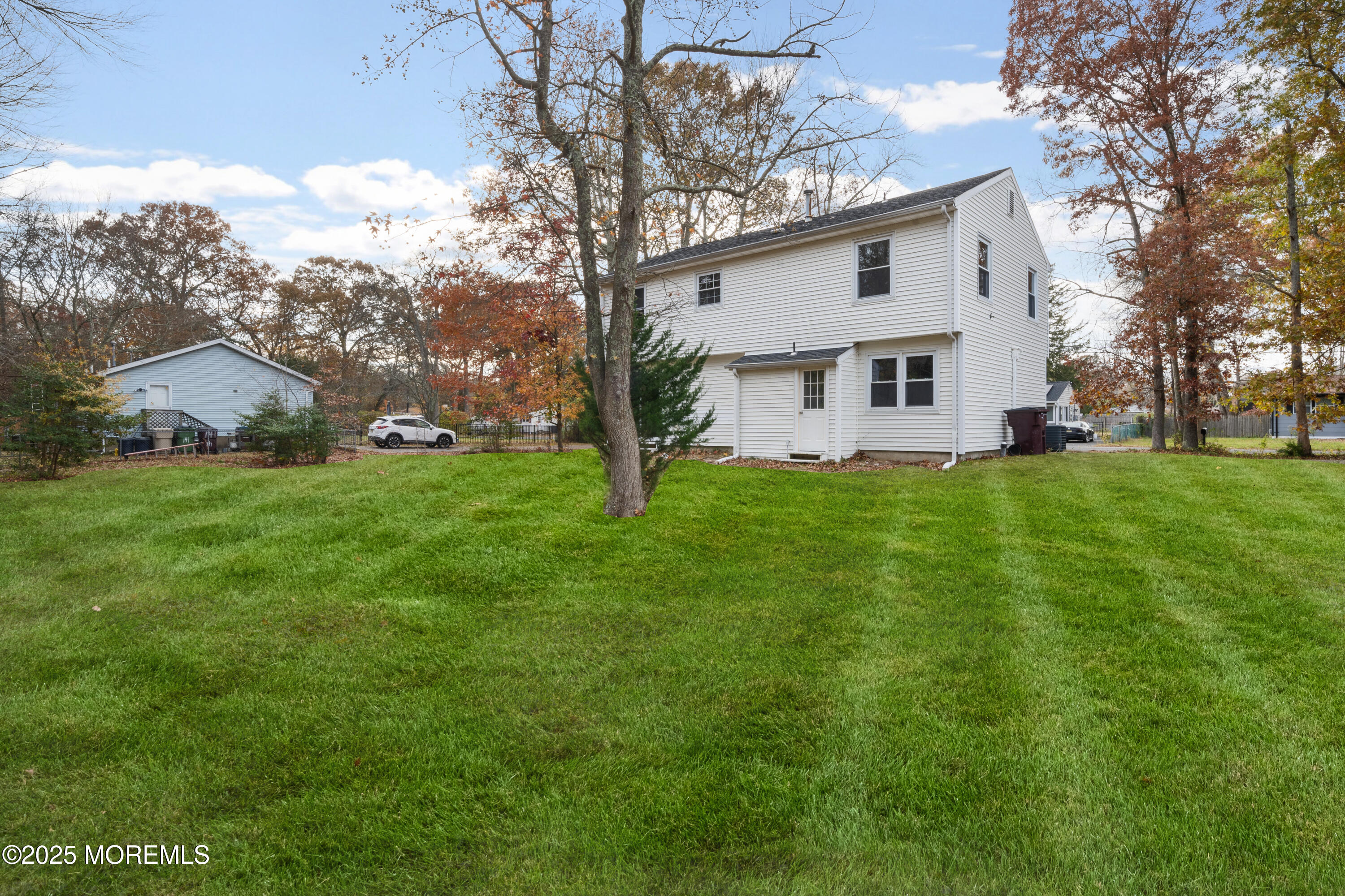 137 Red Bank Avenue Bayville, NJ 08721 - Photo 9 of 24 a view of a house with a yard