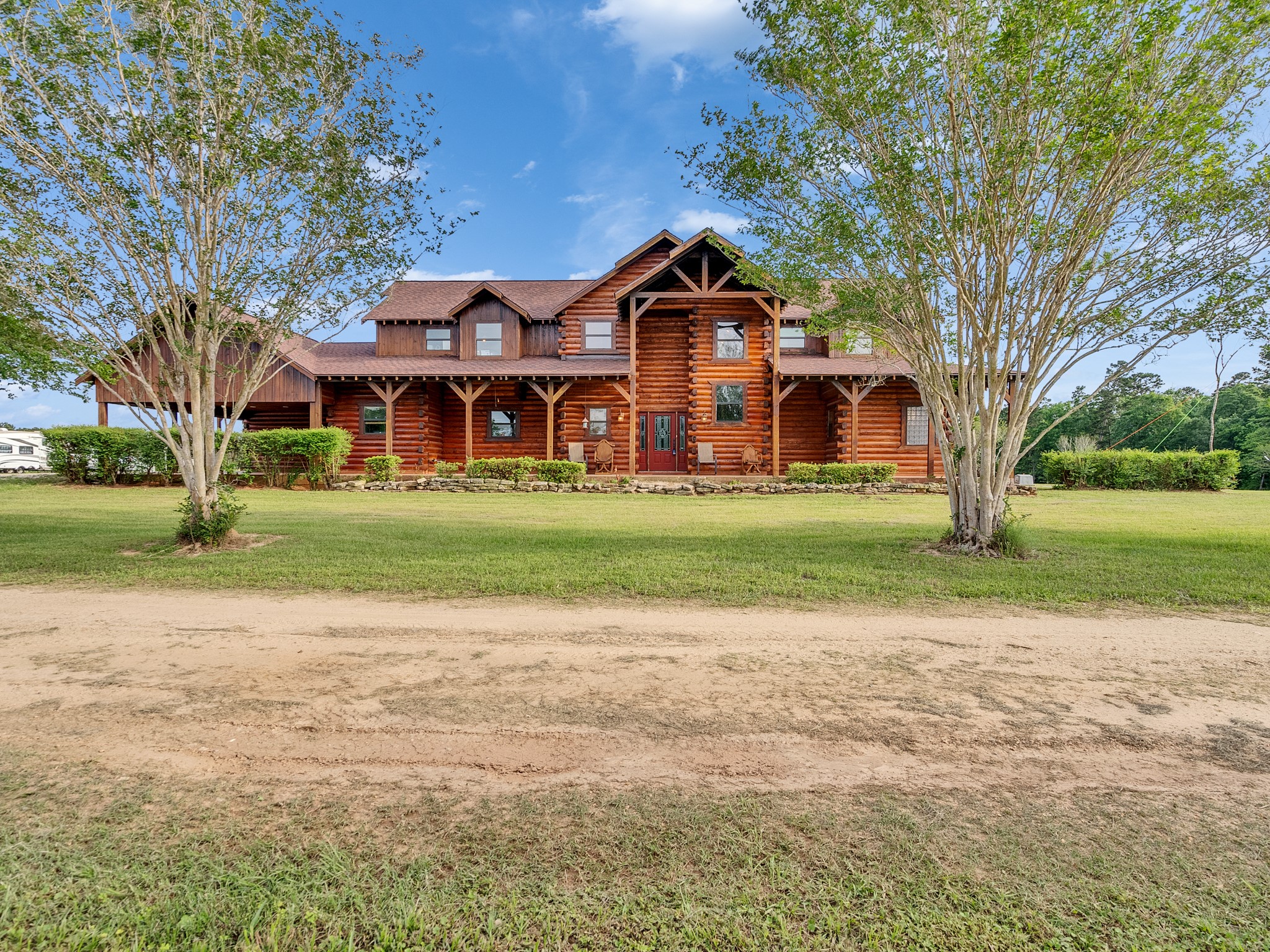 325 Forest Service 217 Road Shepherd, TX 77371 - Photo 4 of 46 a front view of house with yard and green space