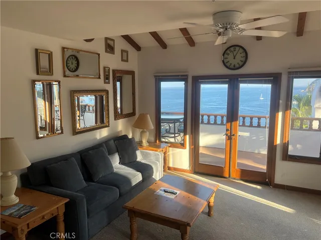 a view of a livingroom with furniture and window