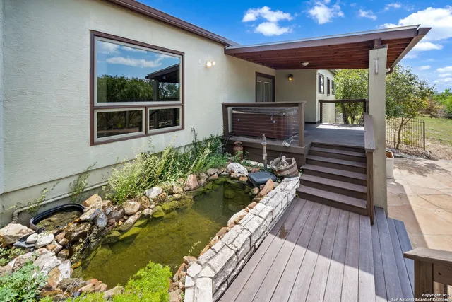 a view of a balcony with chairs
