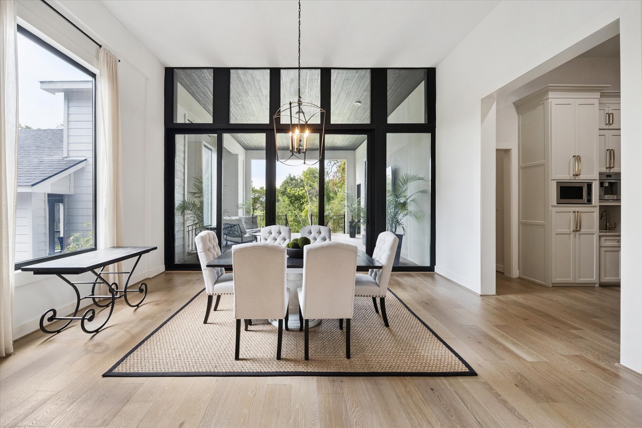11 River Circle Houston, TX 77063 - Photo 9 of 34 a view of a dining room with furniture window and wooden floor