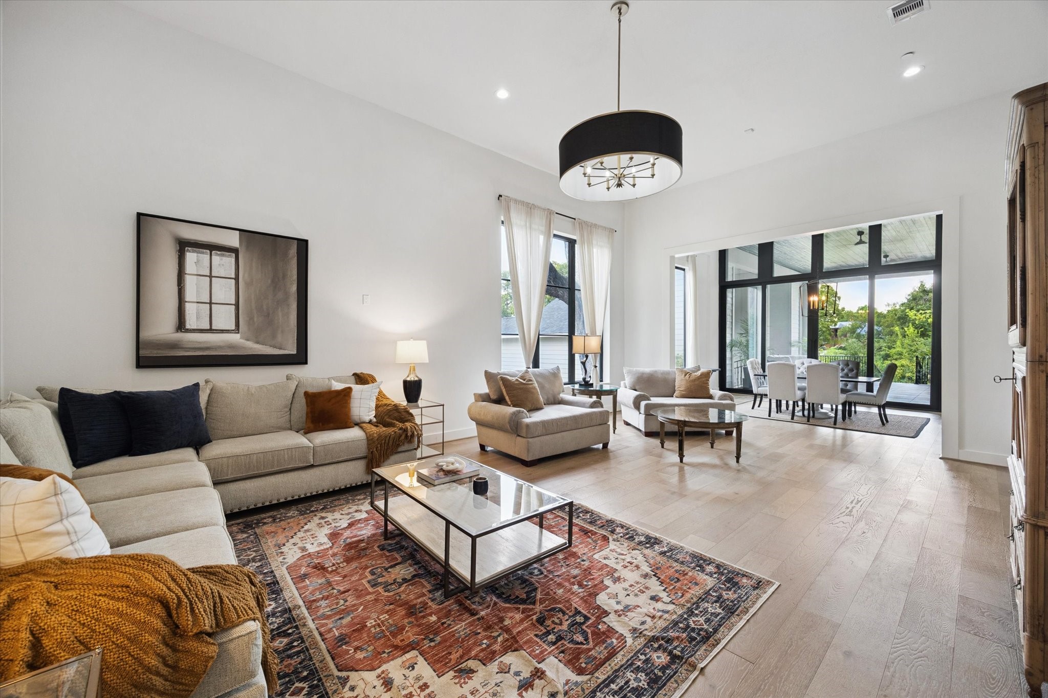 11 River Circle Houston, TX 77063 - Photo 13 of 34 a living room with furniture and a large window
