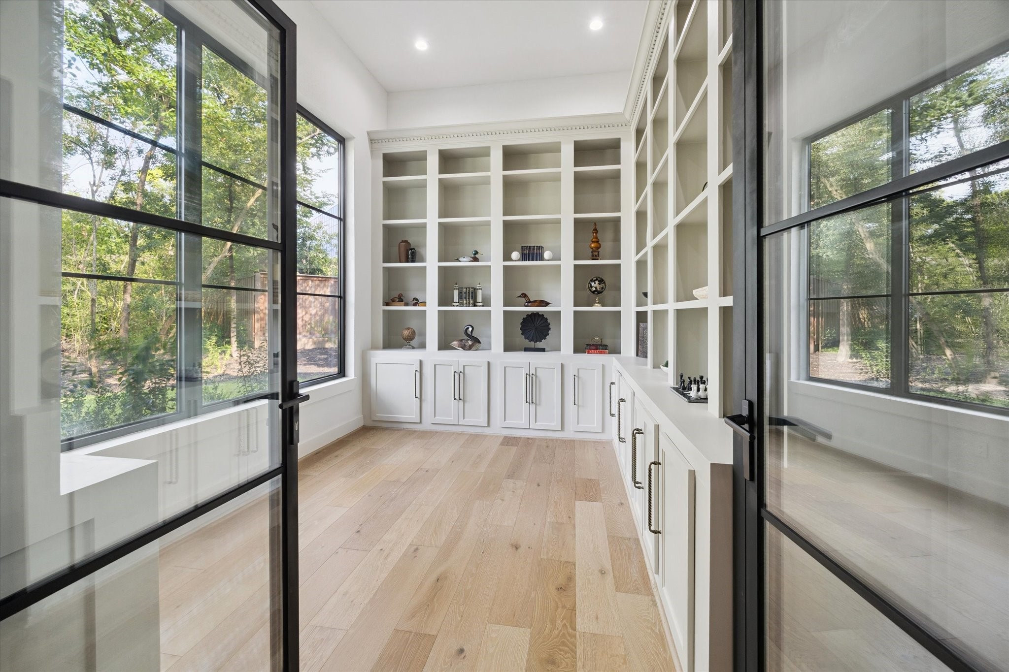 11 River Circle Houston, TX 77063 - Photo 14 of 34 a view of front door with wooden floor
