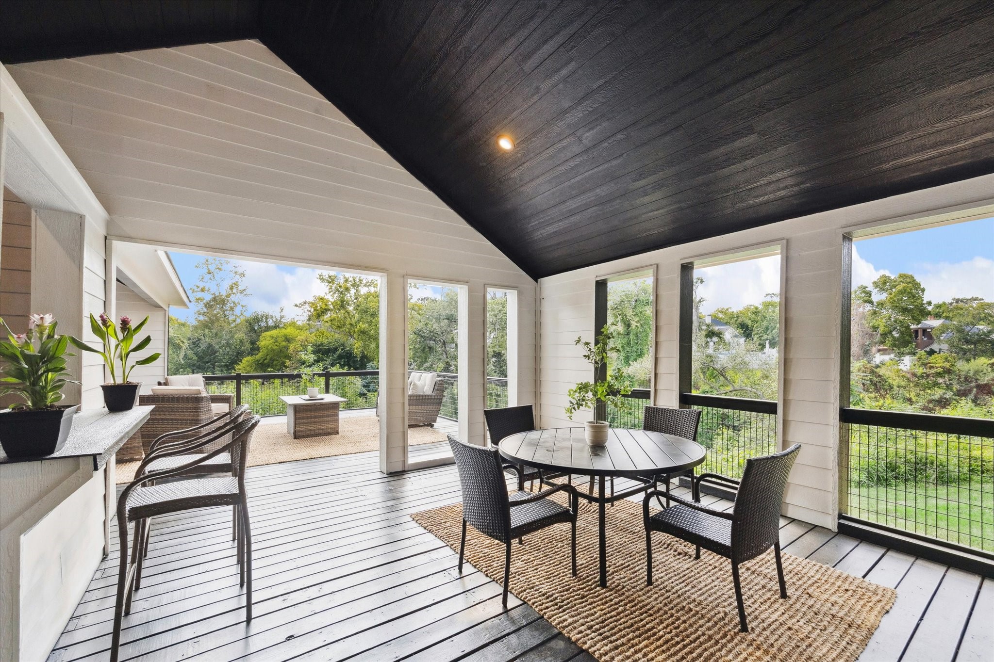 11 River Circle Houston, TX 77063 - Photo 1 of 34 a dining room with furniture window and wooden floor