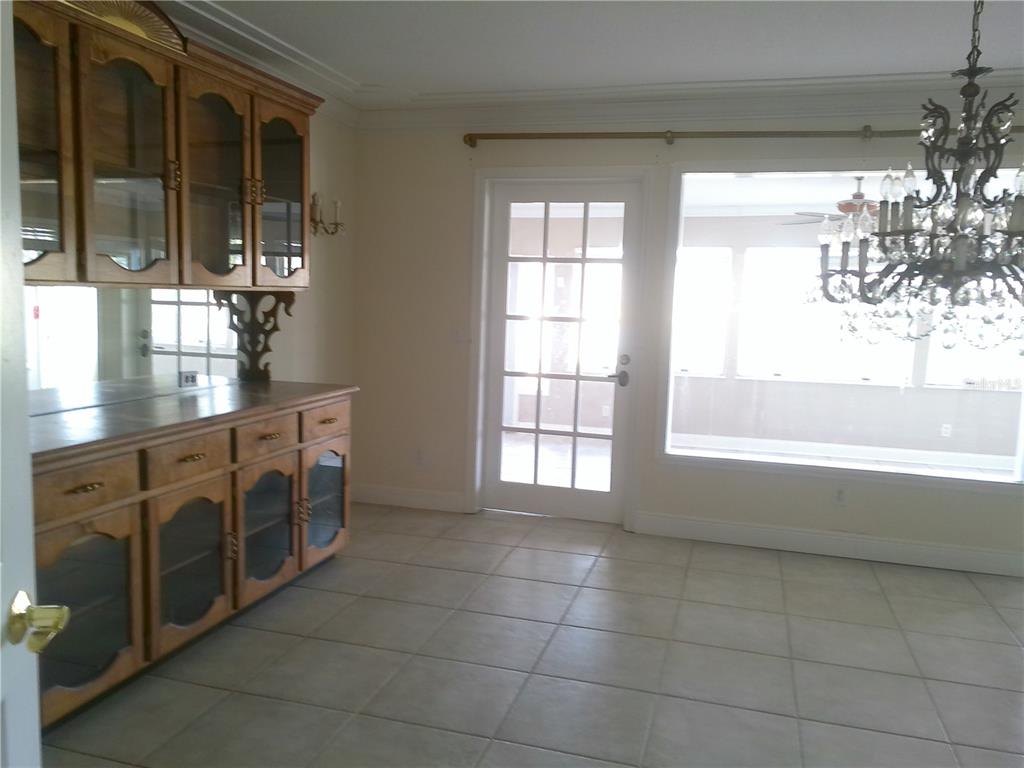 3821 East Osceola Road Geneva, FL 32732 - Photo 17 of 37 a spacious bathroom with a double vanity sink a large mirror and a bathtub