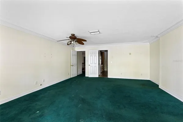 a view of a kitchen with a sink and a window