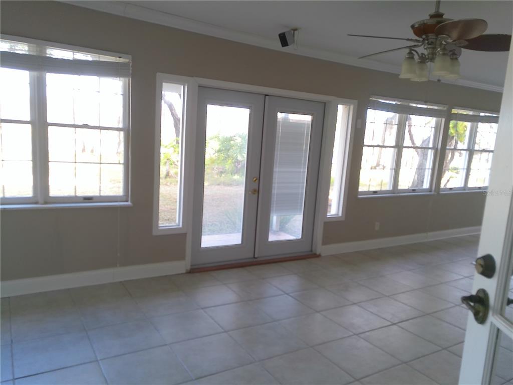 3821 East Osceola Road Geneva, FL 32732 - Photo 20 of 37 a view of an empty room with a window