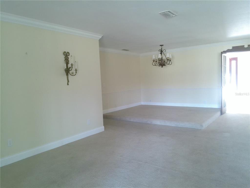 3821 East Osceola Road Geneva, FL 32732 - Photo 21 of 37 an empty room with a window