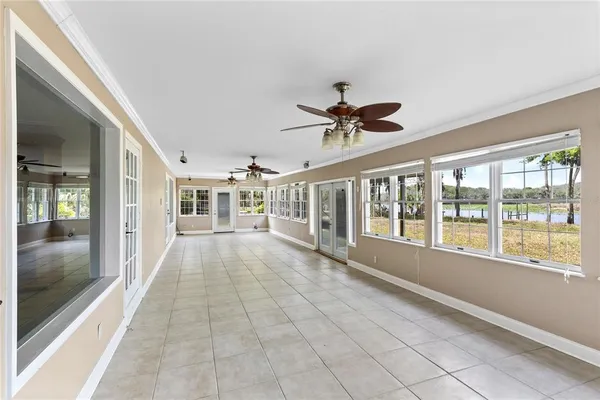 a view of hallway with windows
