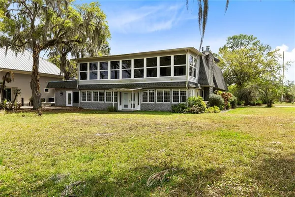 a view of a house with a swimming pool