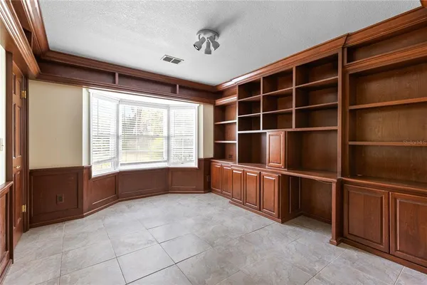 a room with furniture and a window