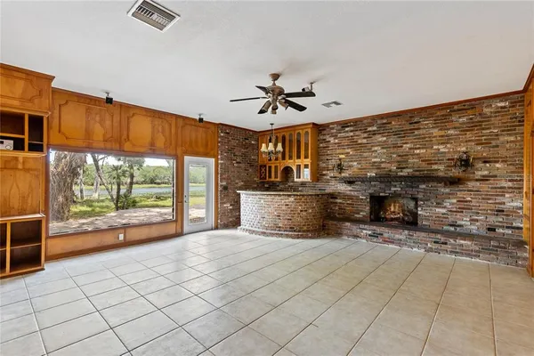 a view of a kitchen with furniture and a kitchen