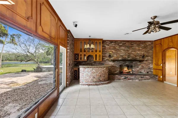 a view of a patio with a table and chairs