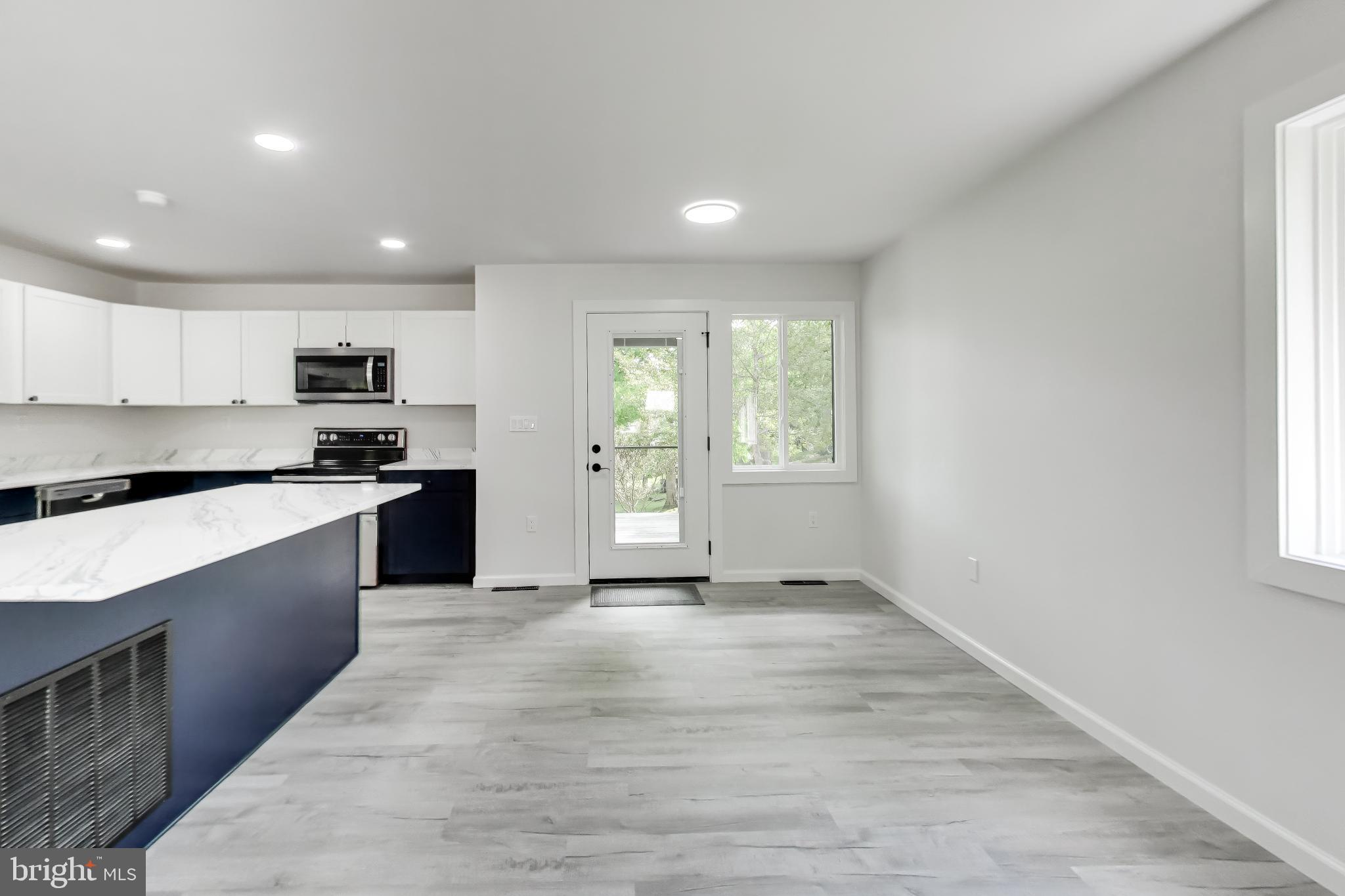 810 Malta Lane Silver Spring, MD 20901 - Photo 9 of 35 Modern kitchen with sleek design.