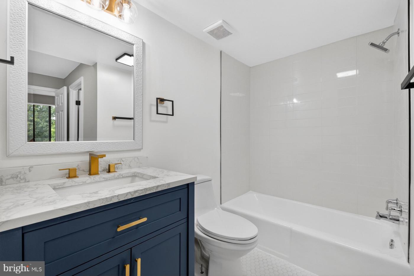 1401 North Rhodes Street, Unit 604 Arlington, VA 22209 - Photo 18 of 25 Fully Renovated Bathroom