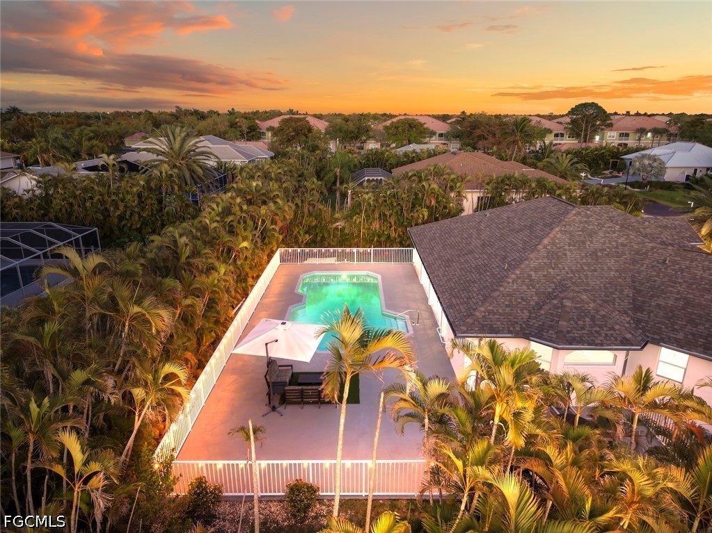 13570 Harbour Ridge Drive Fort Myers, FL 33908 - Photo 39 of 50 a view of a swimming pool with a patio