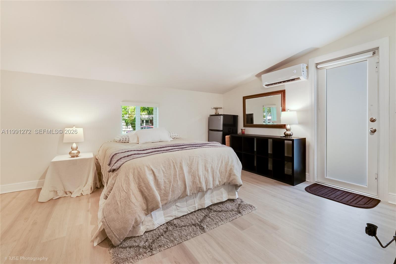 8535 Southwest 97th Road Miami, FL 33173 - Photo 17 of 28 a spacious bedroom with a bed and a dresser