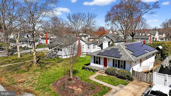 an aerial view of residential building and ocean