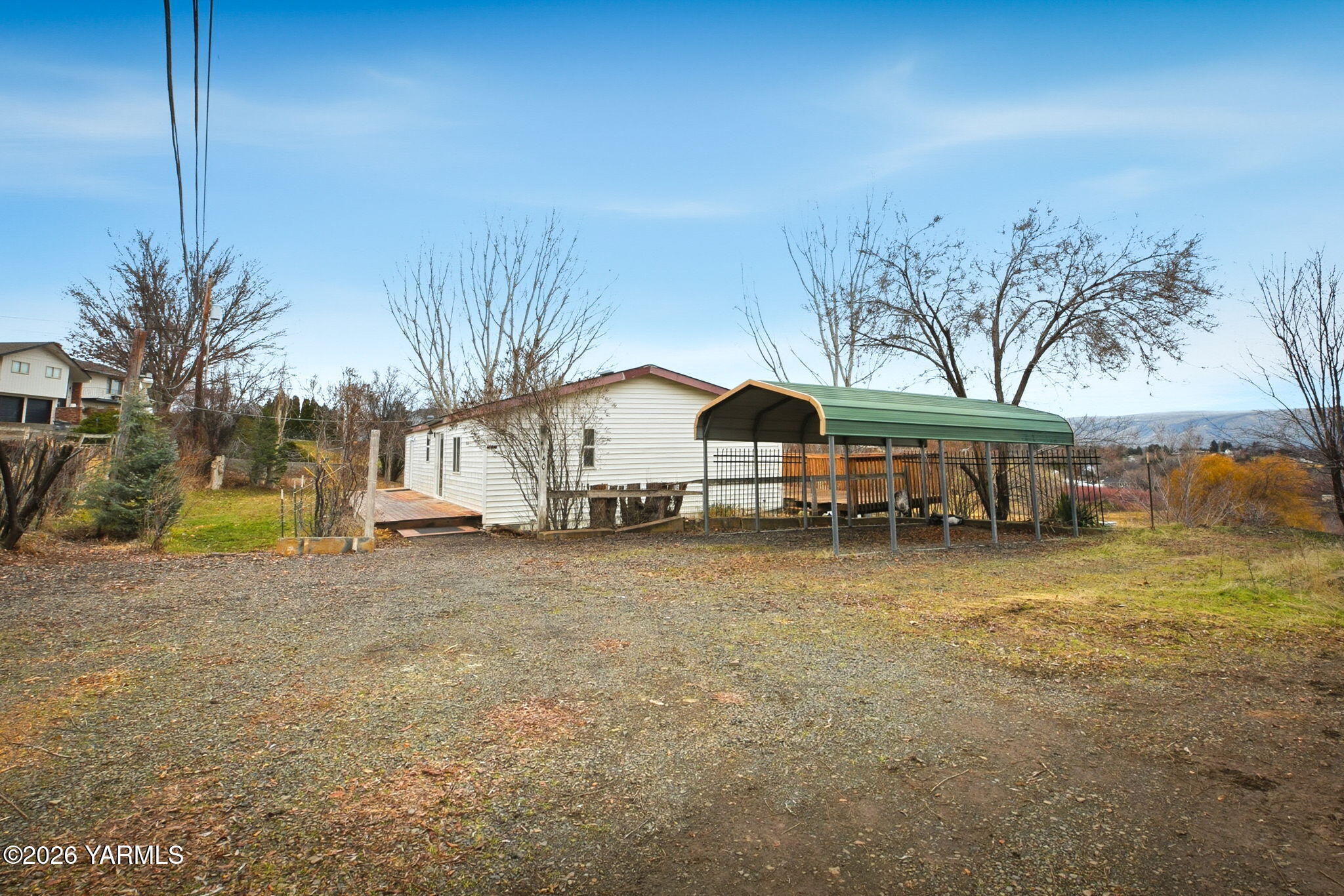 140 Duim Road Selah, WA 98942 - Photo 3 of 22 a view of a house with a yard and tree