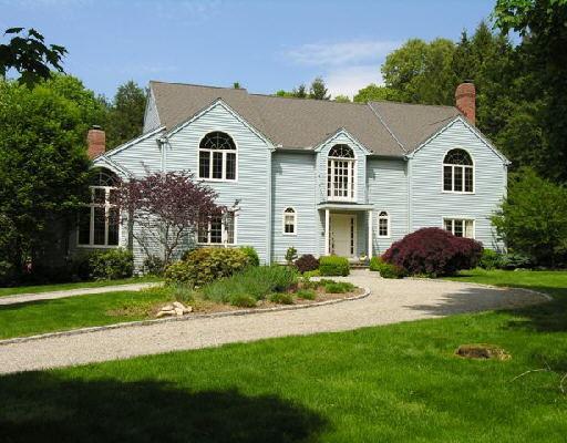 89 Valley Forge Road Weston, CT 06883 - Photo 1 of 1 a front view of a house with a yard