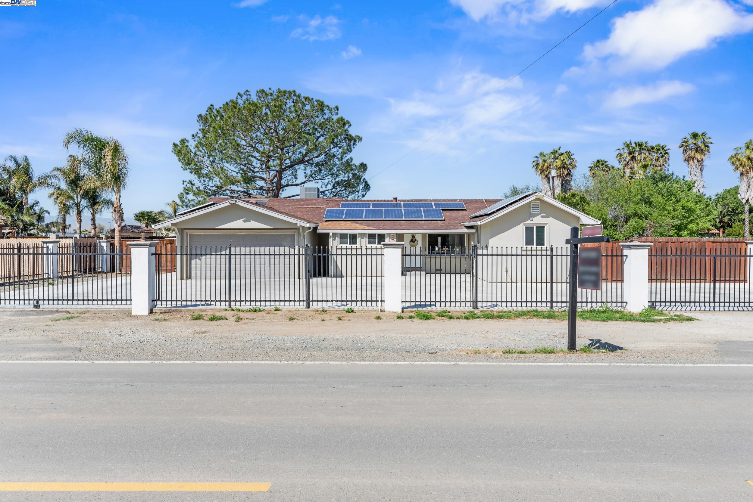 31145 South Koster Road Tracy, CA 95304 - Photo 1 of 1 front view of a house with a street