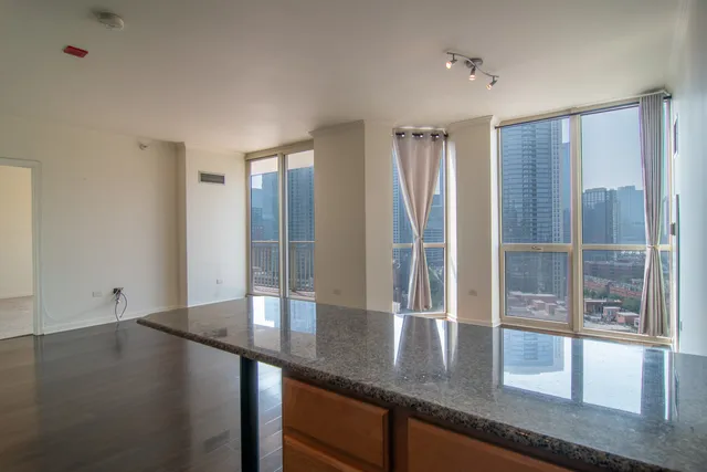 a view of a counter top space in an empty room