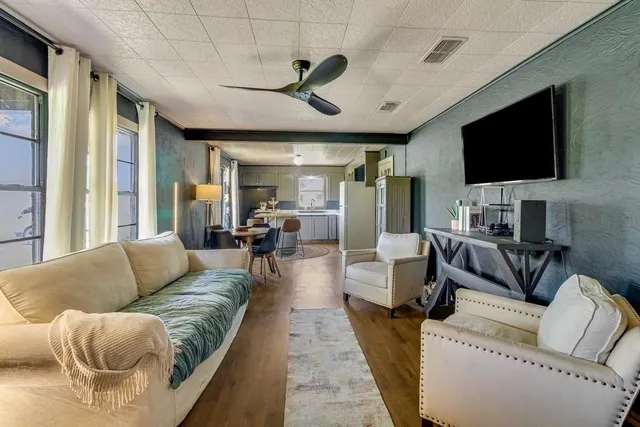 a bathroom with a toilet a sink and bathtub