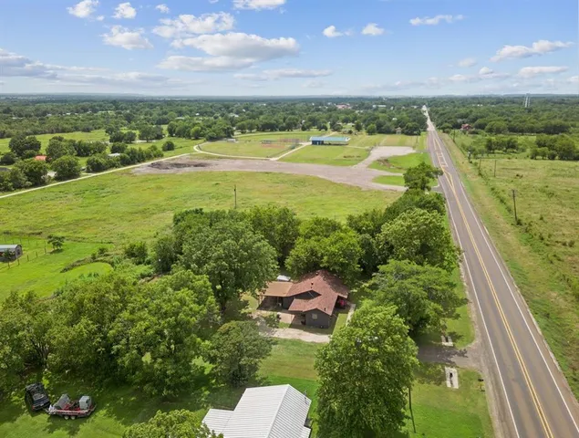 a view of a lake with a yard
