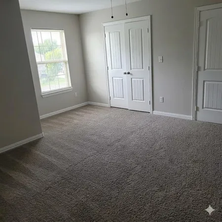 an empty room with windows