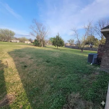 a view of outdoor space and yard