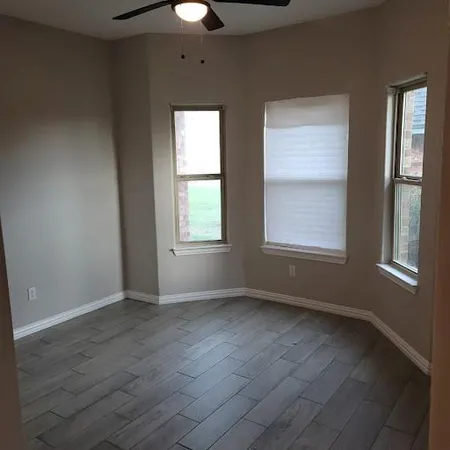 an empty room with windows