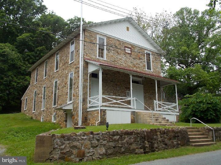 1638 Yellow Springs Road Chester Springs, PA 19425 - Photo 21 of 24 a front view of a house with a yard