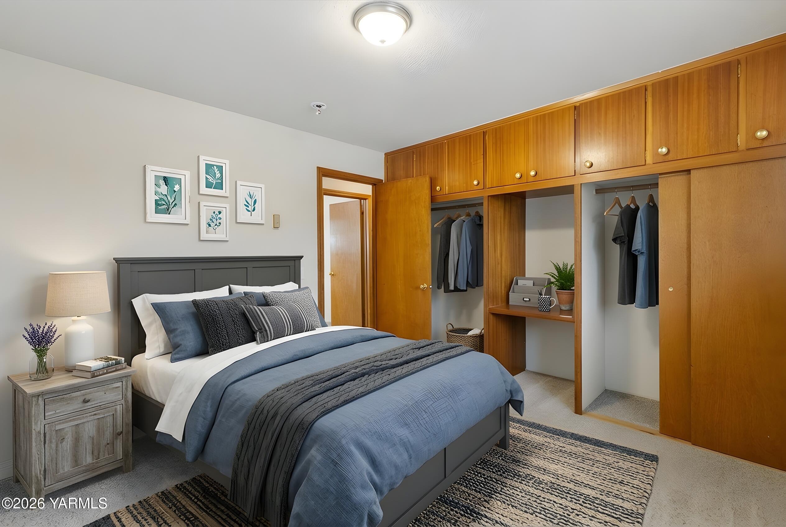 2907 South 3rd Street Union Gap, WA 98903 - Photo 12 of 26 a bedroom with bed and wooden floor