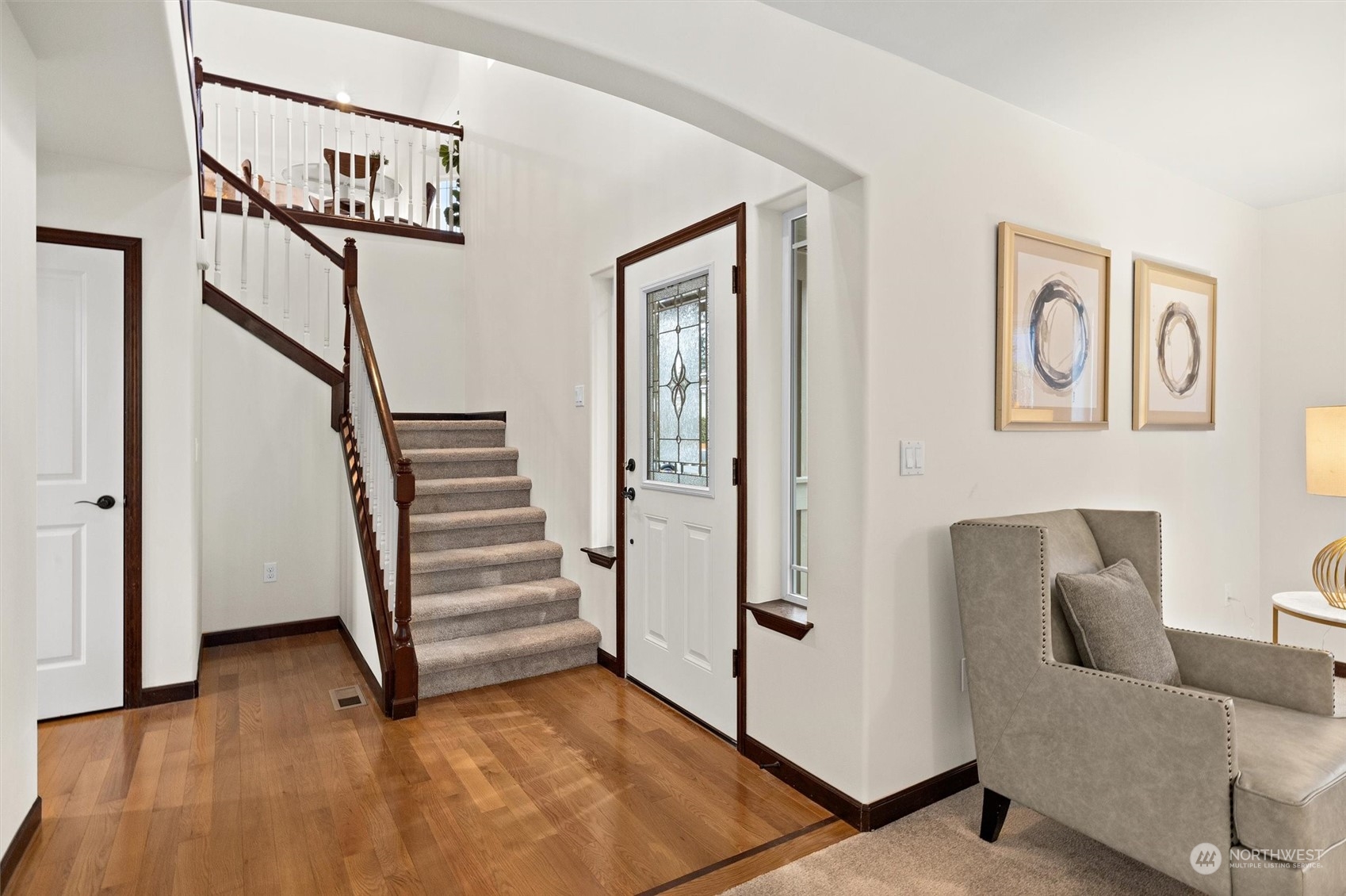 2205 239th Place Southwest Bothell, WA 98021 - Photo 14 of 40 a view of a hallway with stairs and furniture