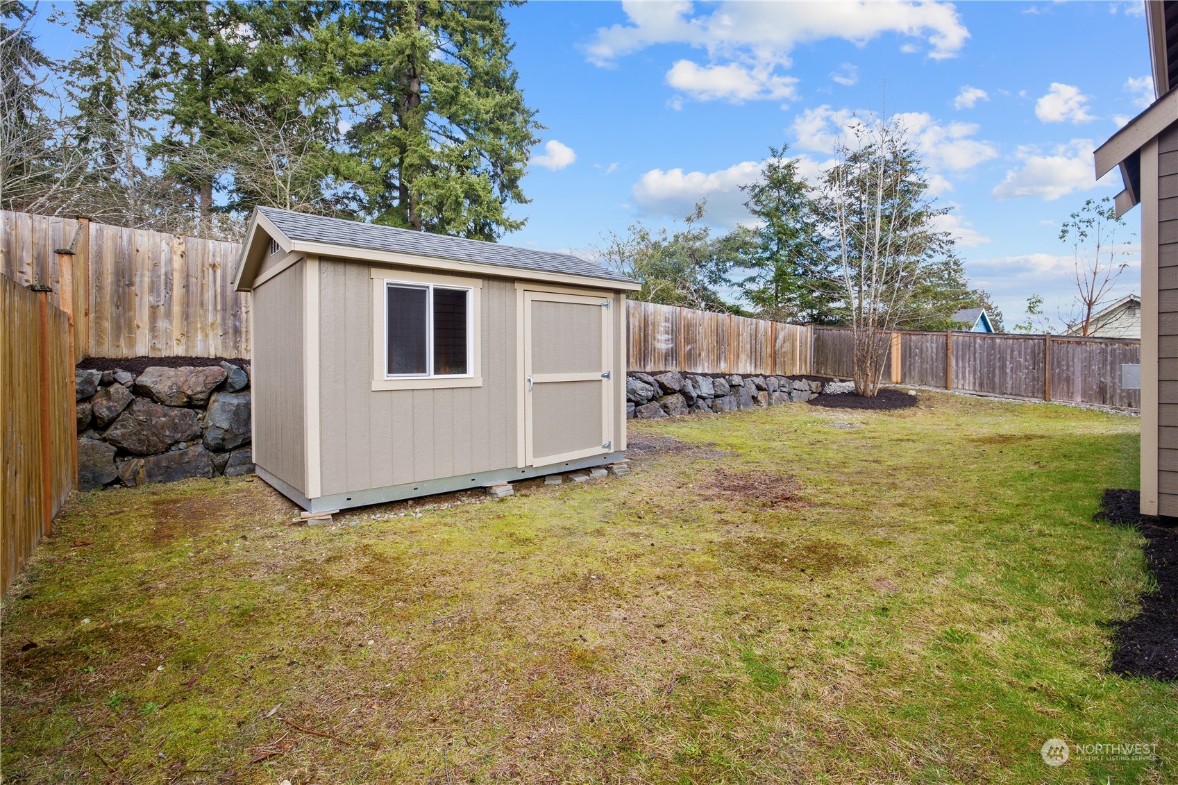 2205 239th Place Southwest Bothell, WA 98021 - Photo 36 of 40 a view of a backyard with a small cabin