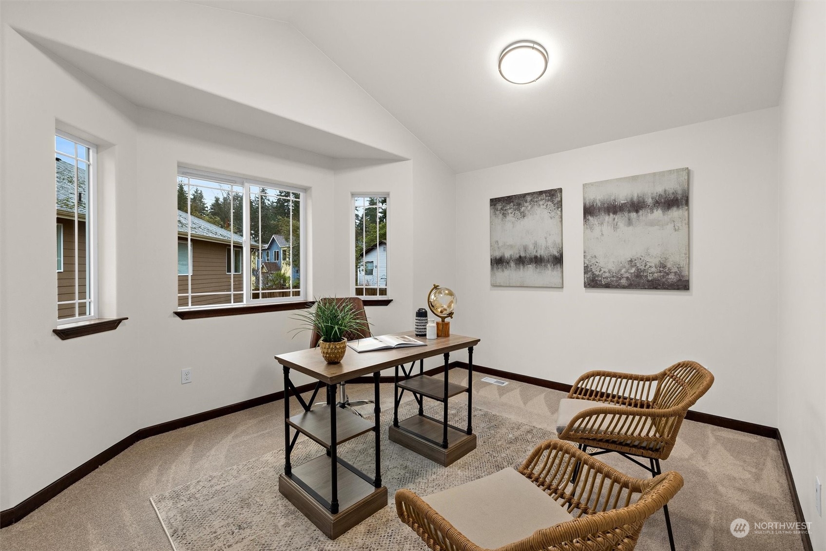 2205 239th Place Southwest Bothell, WA 98021 - Photo 8 of 40 a view of a livingroom with furniture and windows