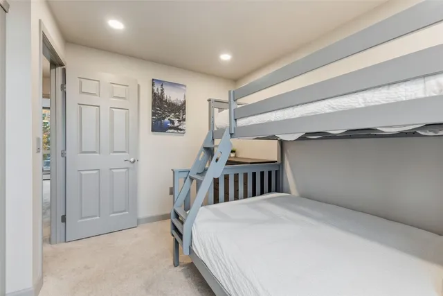 a bedroom with a bed and a walk in closet