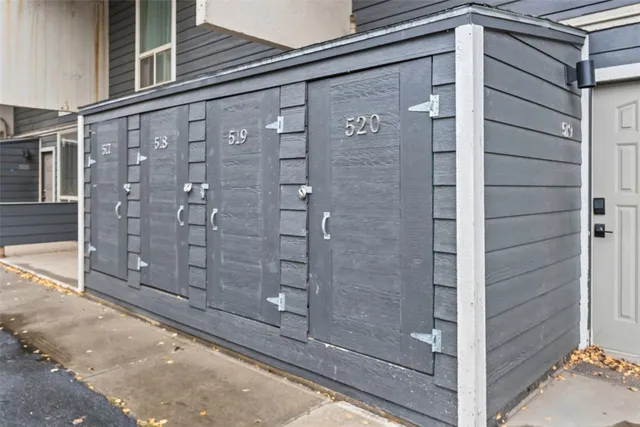 a view of a backyard with sitting area