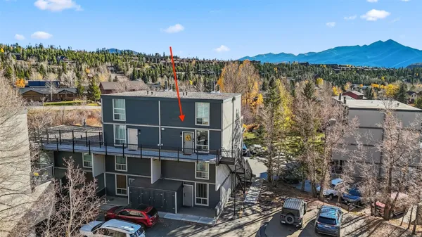 a view of a pathway of a building from a balcony