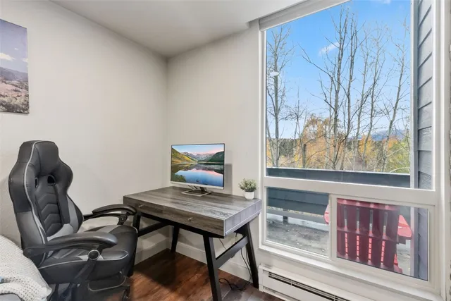 a workspace with furniture and lamp