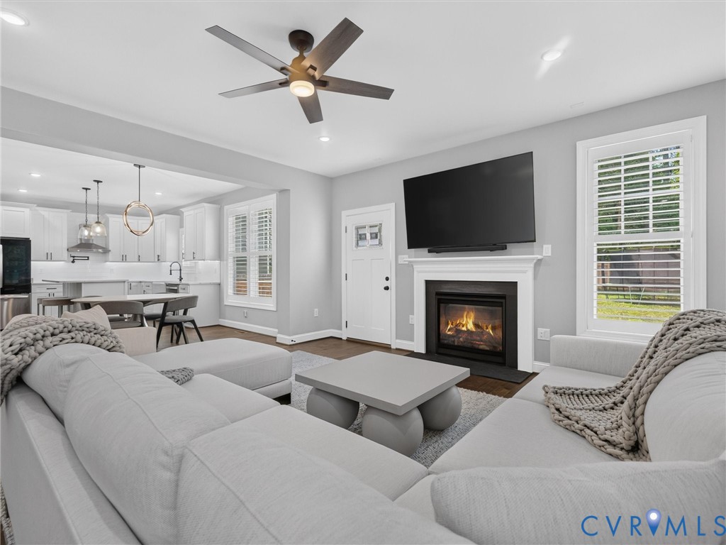 9011 Midway Road Henrico, VA 23229 - Photo 30 of 65 Living room featuring a modern fireplace with a wh