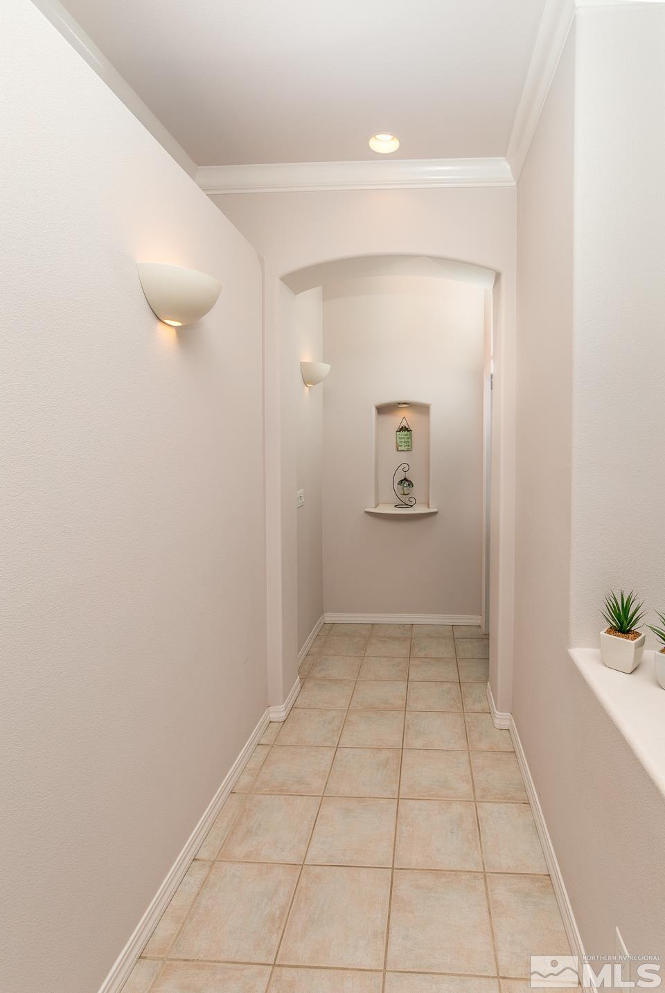 5275 Rivers Edge Drive Fallon, NV 89406 - Photo 13 of 36 an empty room with cabinet and mirror