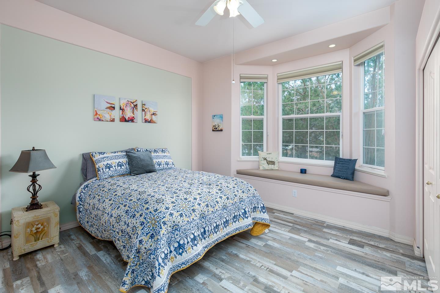 5275 Rivers Edge Drive Fallon, NV 89406 - Photo 14 of 36 a bedroom with a bed and a large window