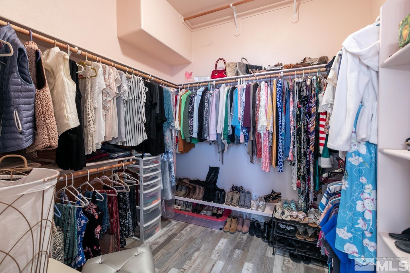 5275 Rivers Edge Drive Fallon, NV 89406 - Photo 20 of 36 a view of walk in closet with clothes and shoes