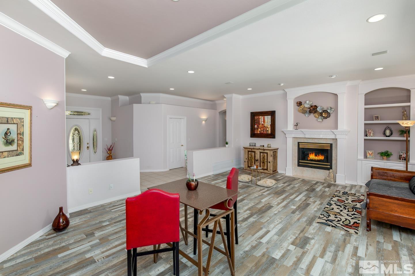 5275 Rivers Edge Drive Fallon, NV 89406 - Photo 3 of 36 a living room with furniture and a fireplace