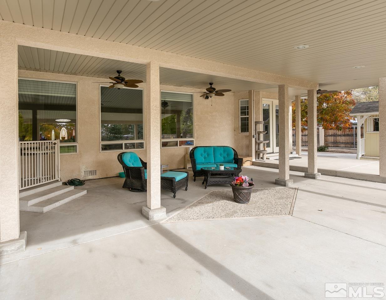 5275 Rivers Edge Drive Fallon, NV 89406 - Photo 31 of 36 a view of a livingroom with furniture and windows